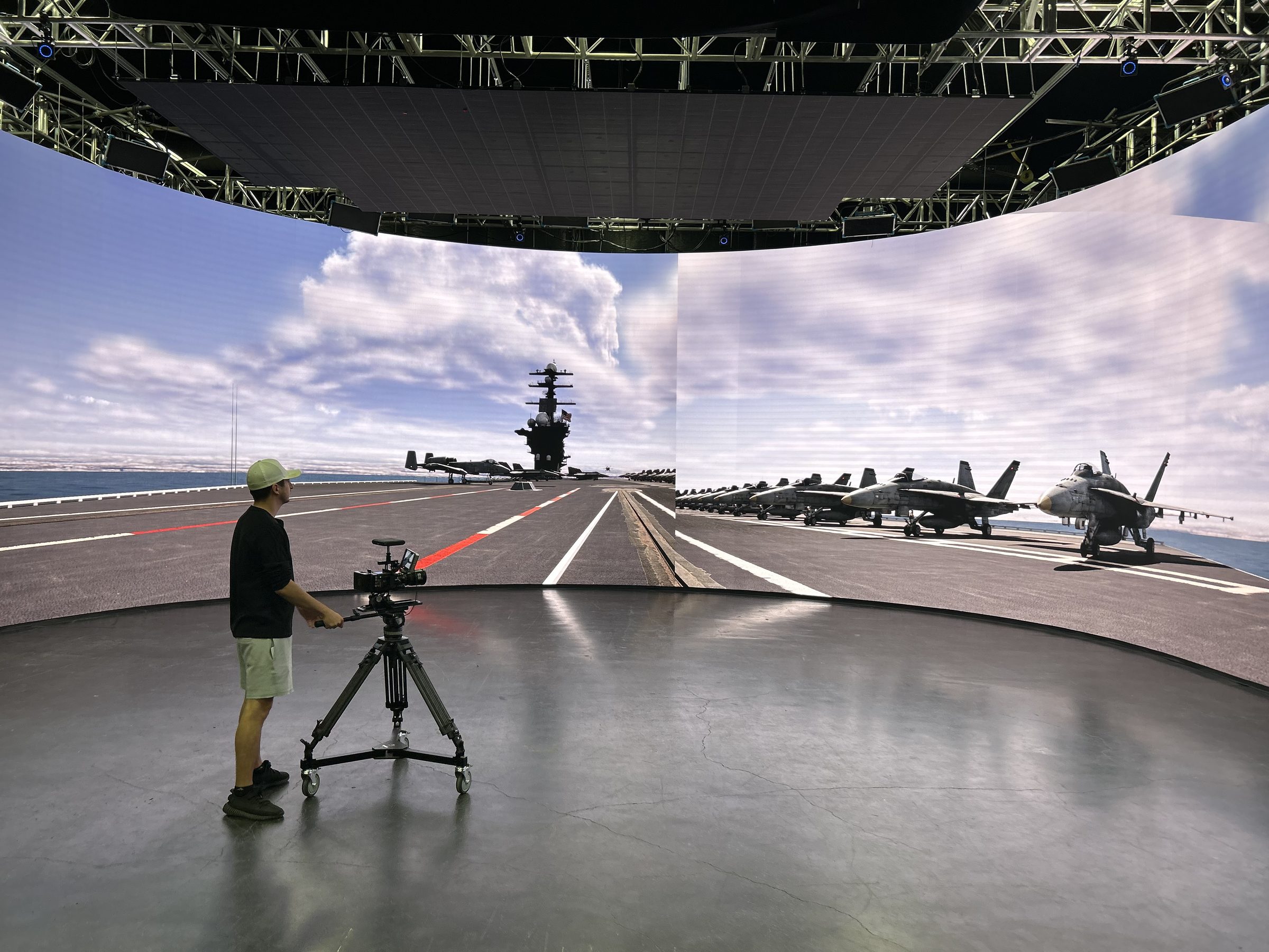 Virtual production stage rendering a carrier deck for Pan Air Network filming
